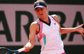 Irina Begu hits a forehand at Roland Garros 2022