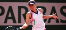 Irina Begu hits a forehand at Roland Garros 2022